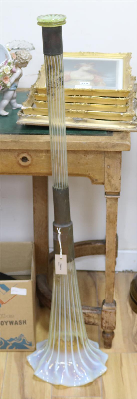 A large floor-standing vaseline glass trumpet vase, metal-mounted, H 45in (foot deficient)